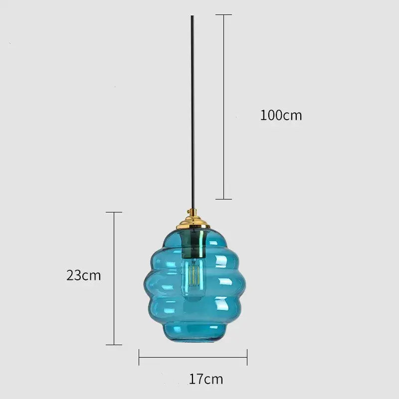 Honeycomb amber blue and gray glass pendant light with translucent honeycomb design and brass accents for kitchen decorbites colorful glass ball decor