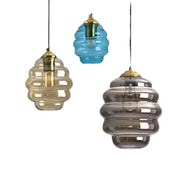 Honeycomb amber blue and gray glass pendant light with gold-toned metal fixtures for kitchen dining decorbites colorful glass