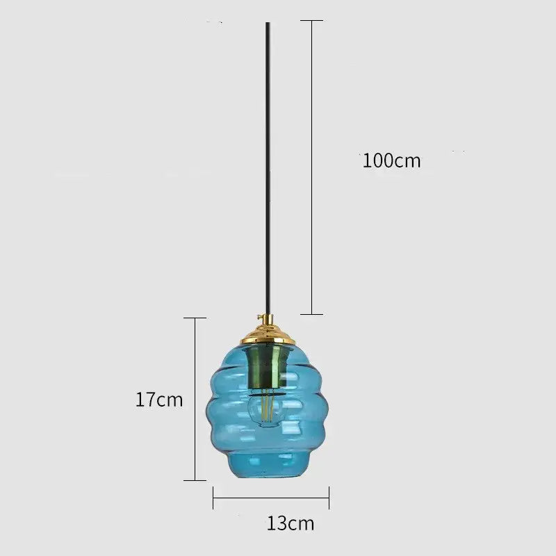 Blue translucent honeycomb textured glass pendant light with gold fixture for kitchen dining decorbites colorful glass