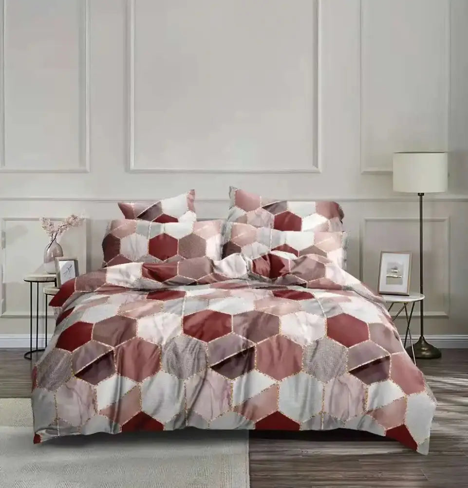A cozy bedding set with a decorbites honeycomb marble geometric pattern in rose gold burgundy and cream shades