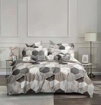 Gray and white hexagonal patterned bedding set with metallic gold stitching for decorbites honeycomb marble collection