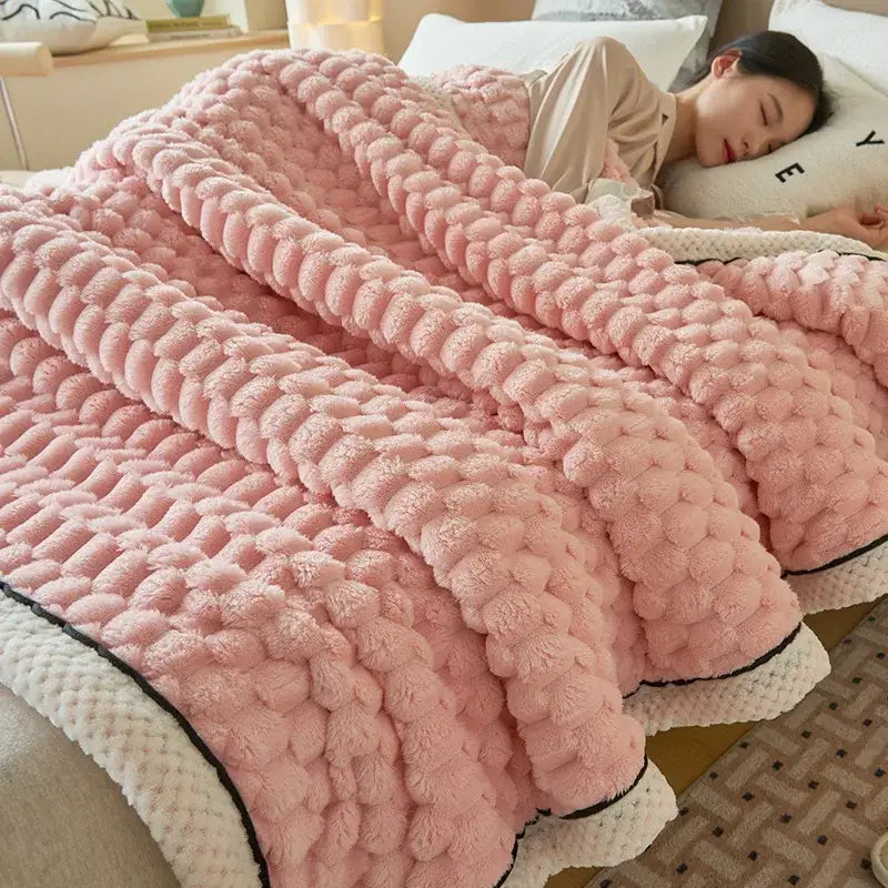 Pink chunky knit throw blanket with plush textured surface and white trim for decorbites cozy coral fleece bed use