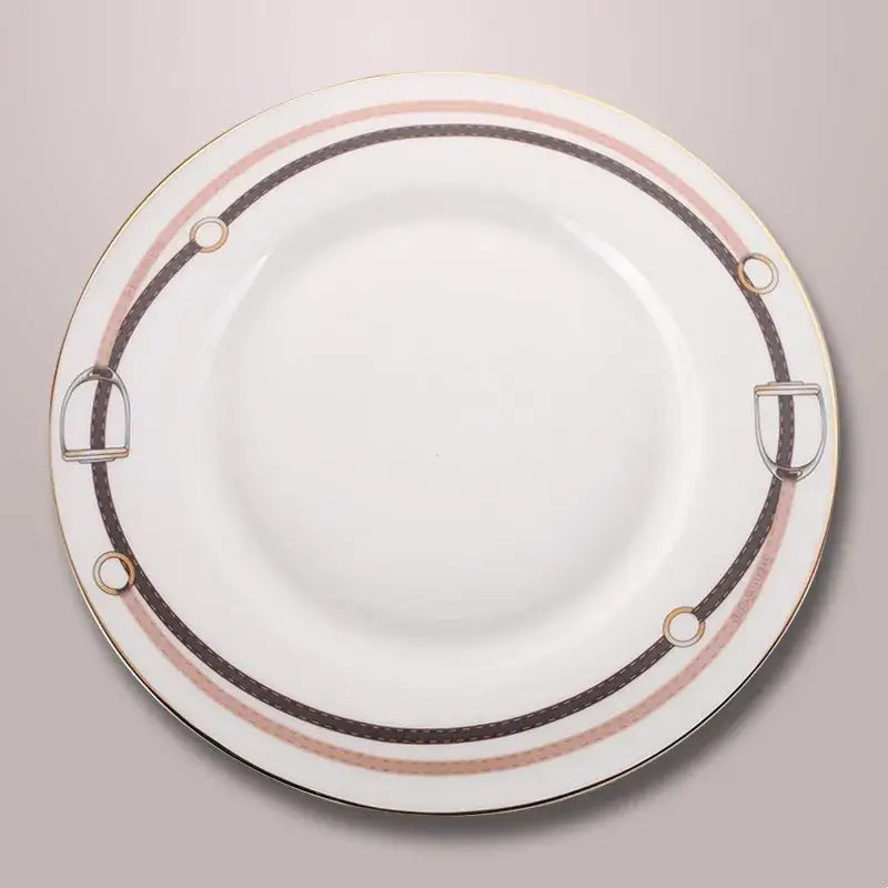 White ceramic plate with gold rim and black horsebit handles featuring pink and brown stripes from decorbites bone china tableware set