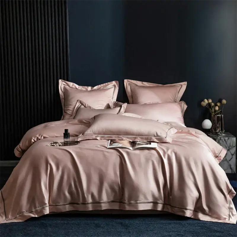 A luxurious blush pink satin bedding set with subtle piping in decorbites 1000tc egyptian cotton for elegant decor