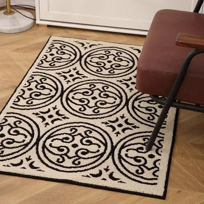 Cream-colored houndstooth black ivory area rug with black circular medallions and solid black border for living room decorbites black ivory area