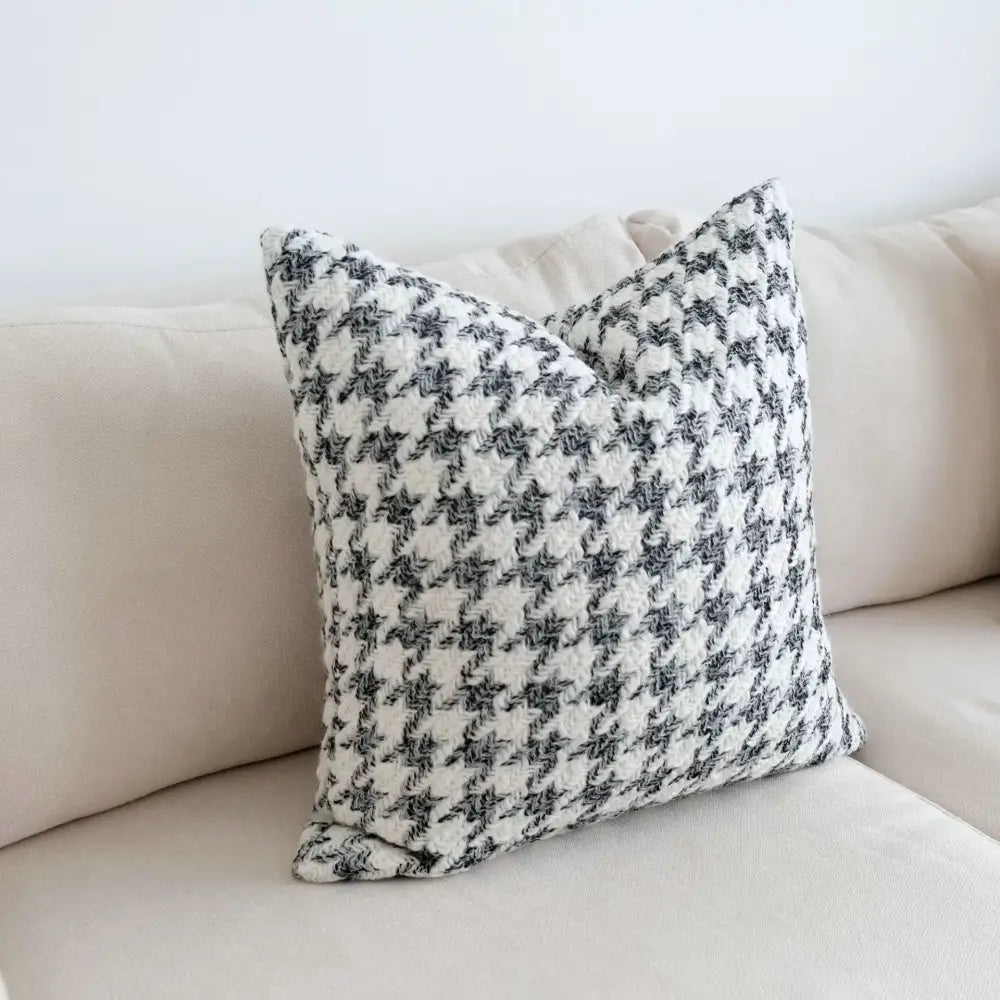 A cozy cushion cover with black and white houndstooth pattern made from soft fabric by decorbites houndstooth crochet