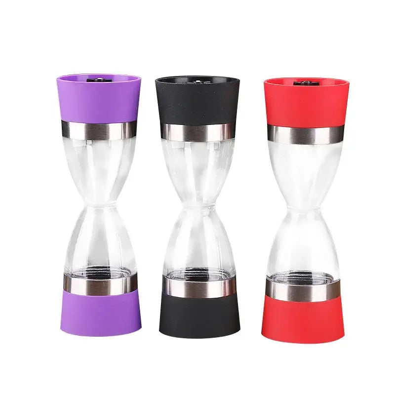 Three modern electric hourglass shape dual spice grinders with clear glass and vibrant silicone accents by decorbites