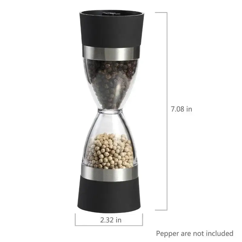 Black and stainless steel hourglass shape dual spice grinder with clear glass chambers holding black and white peppercorns