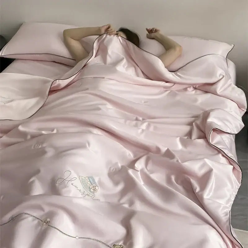 Pink satin duvet cover with delicate embroidery and subtle sheen for decorbites ice rayon summer quilt cream bear floral design