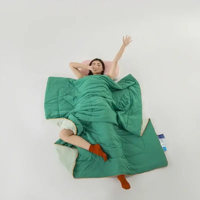 Emerald green quilted sleeping bag with light mint inner lining for ice silk cooling blanket by decorbites