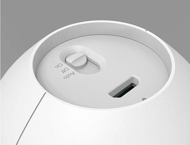 White xiaomi humidifier with circular design and usb port for induction night light in corridor bathroom bedroom use
