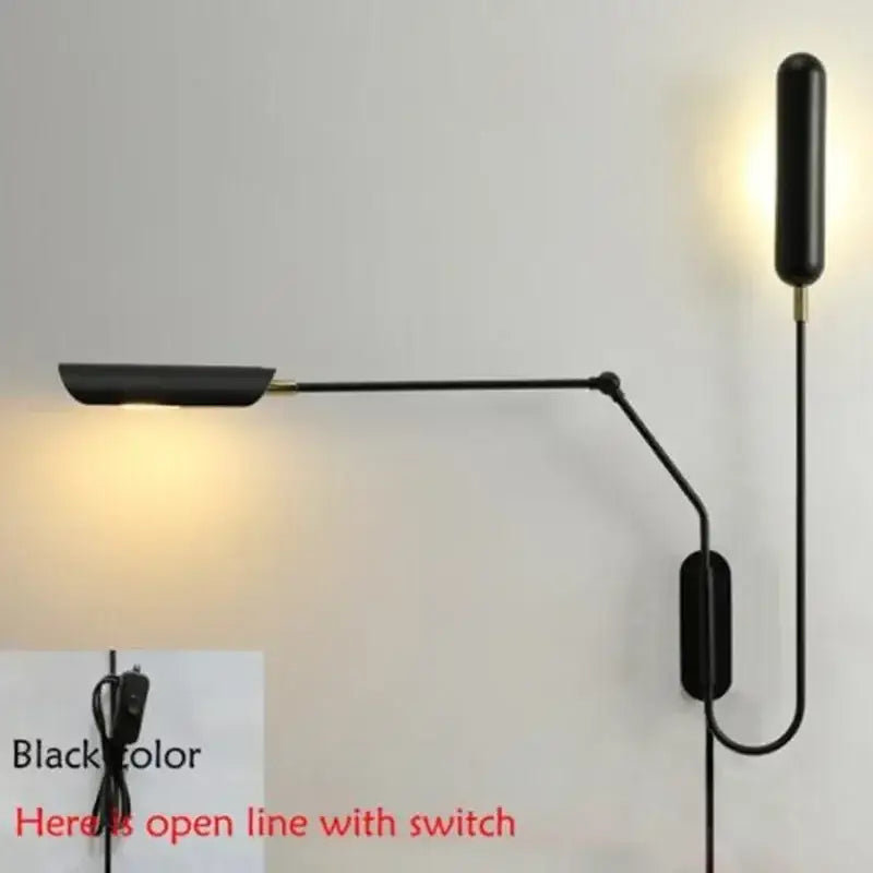 Black wall lamp with sleek articulated arm and cylindrical light head for decorbites industrial adjustable led reading light