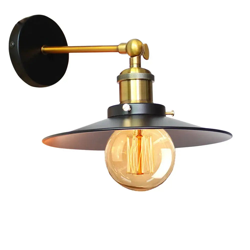 Industrial adjustable wall light with black metal shade, brass accents, and exposed filament bulb for kitchen decorbites industrial adjustable