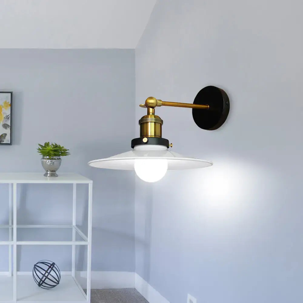 Brass-finished industrial adjustable wall light with white glass shade and black mounting plate for kitchen decorbites industrial adjustable sconce