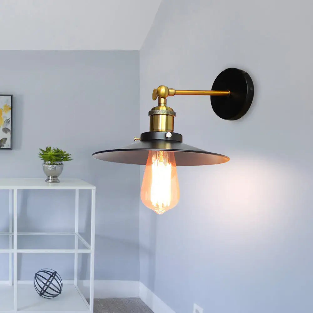 Industrial adjustable wall light with black metal shade brass arm and exposed edison bulb for kitchen decorbites industrial adjustable