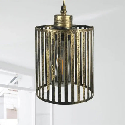 Antique brass cylindrical pendant ceiling light with vertical slats and exposed filament bulb aged brass cylinder shade