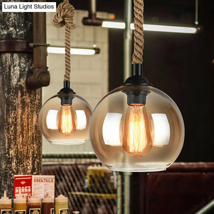 Industrial Amber/Clear Glass Ball Pendant Lamp for Restaurant Ceiling with Rope Rod