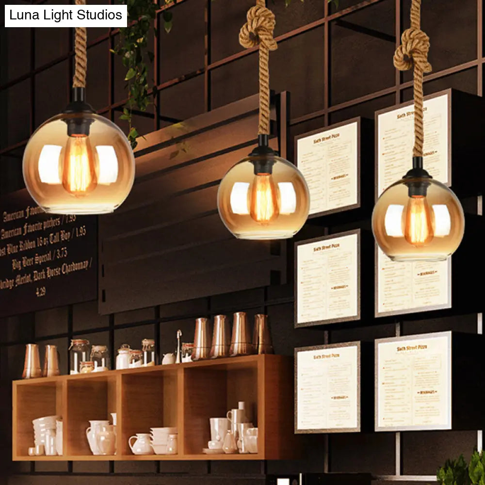 Industrial Amber/Clear Glass Ball Pendant Lamp for Restaurant Ceiling with Rope Rod