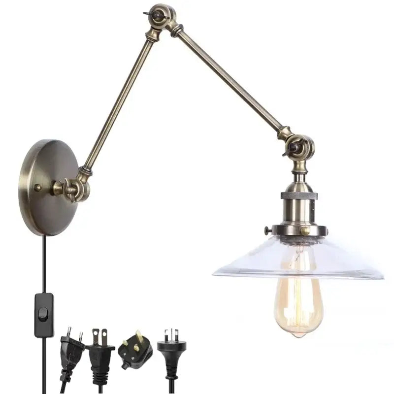 Industrial antique brass adjustable wall sconce with metal arm and clear glass shade featuring exposed edison bulb for bedroom decorbites industrial adjustable led lighting