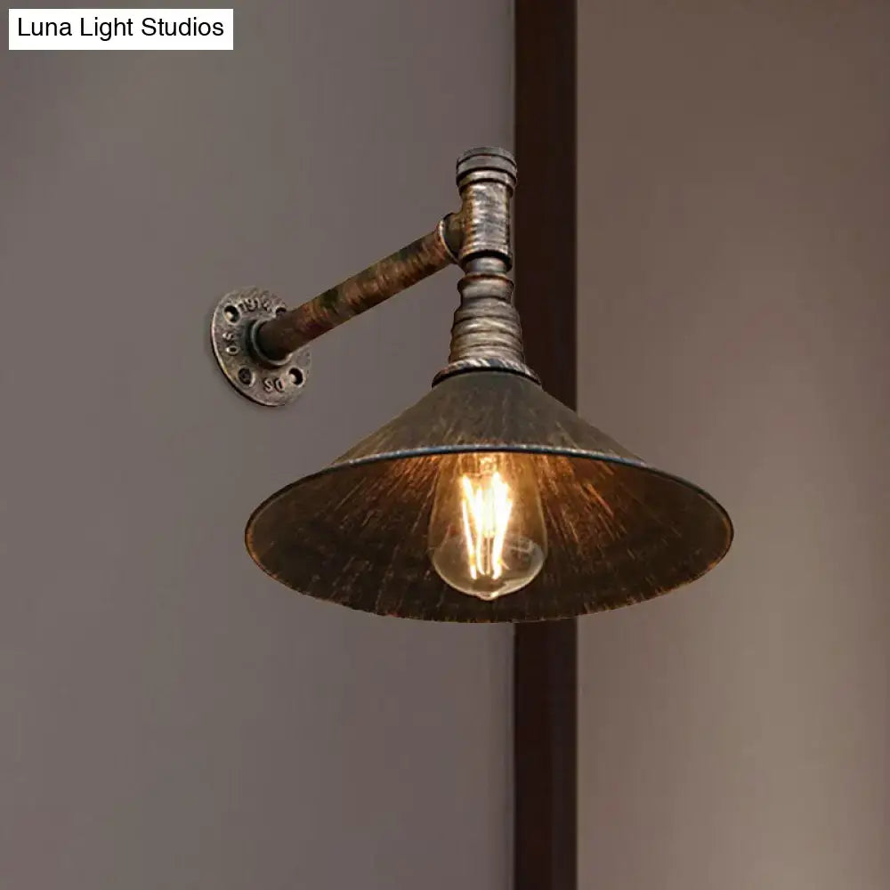 Decorbites™ farmhouse style wall sconce with antique brass cone, weathered bronze finish, and exposed edison bulb