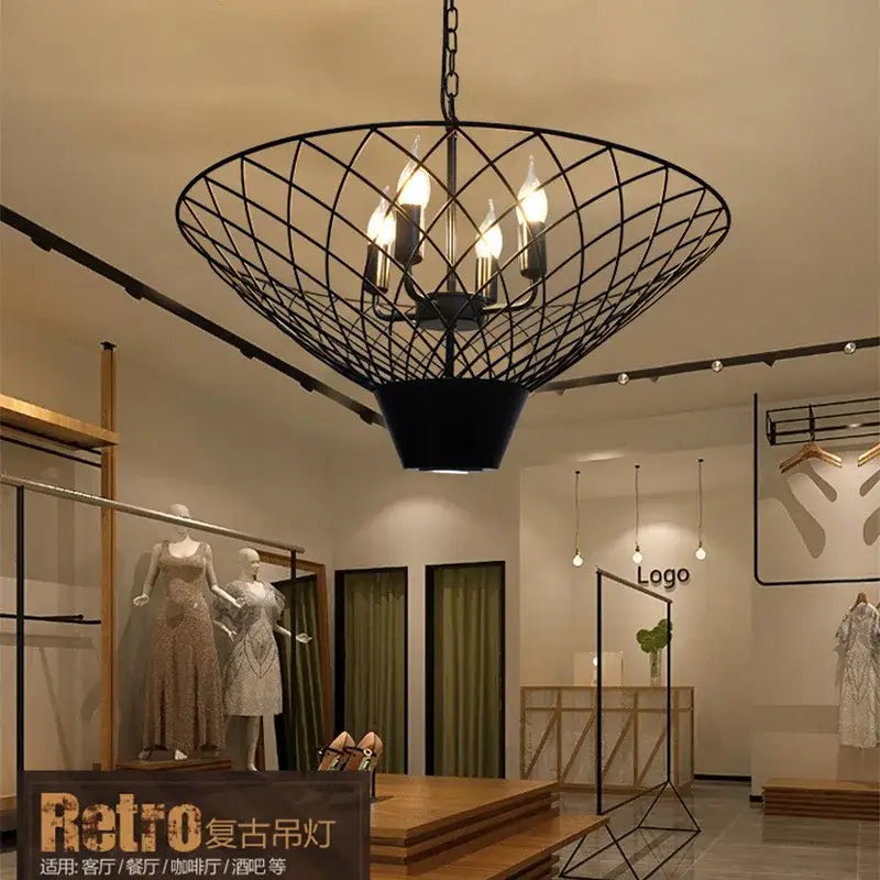Black wrought iron pendant light with geometric wireframe and five exposed bulbs for decorbites industrial barbecue restaurant