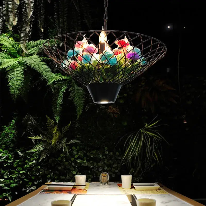Black wireframe basket pendant light with warm bulbs and colorful flowers for decorbites industrial barbecue restaurant