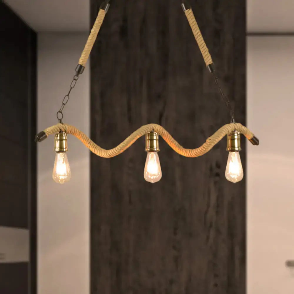 Industrial beige rope pendant light with exposed bulbs and brass fixtures for dining room lighting