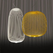 Two modern white and amber industrial birdcage iron pendant lights with slender wire frames for dining room decorbites industrial birdcage