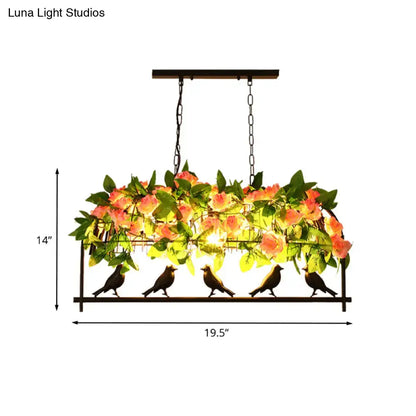 Rectangular decorbites iron industrial birdcage island pendant light with black finish, rose decoration, and bird silhouettes