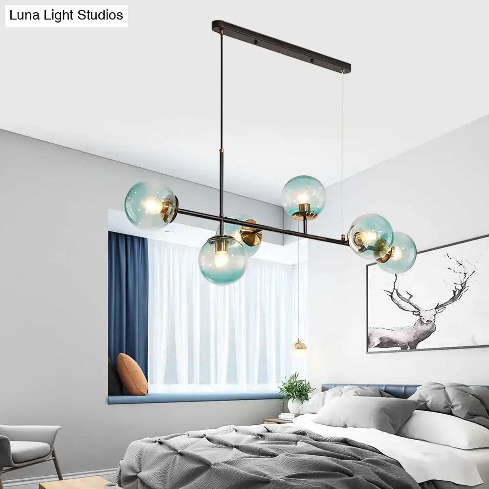 Decorbites 6-light island pendant with modern teal glass globe shade and sleek black metal frame for industrial decor