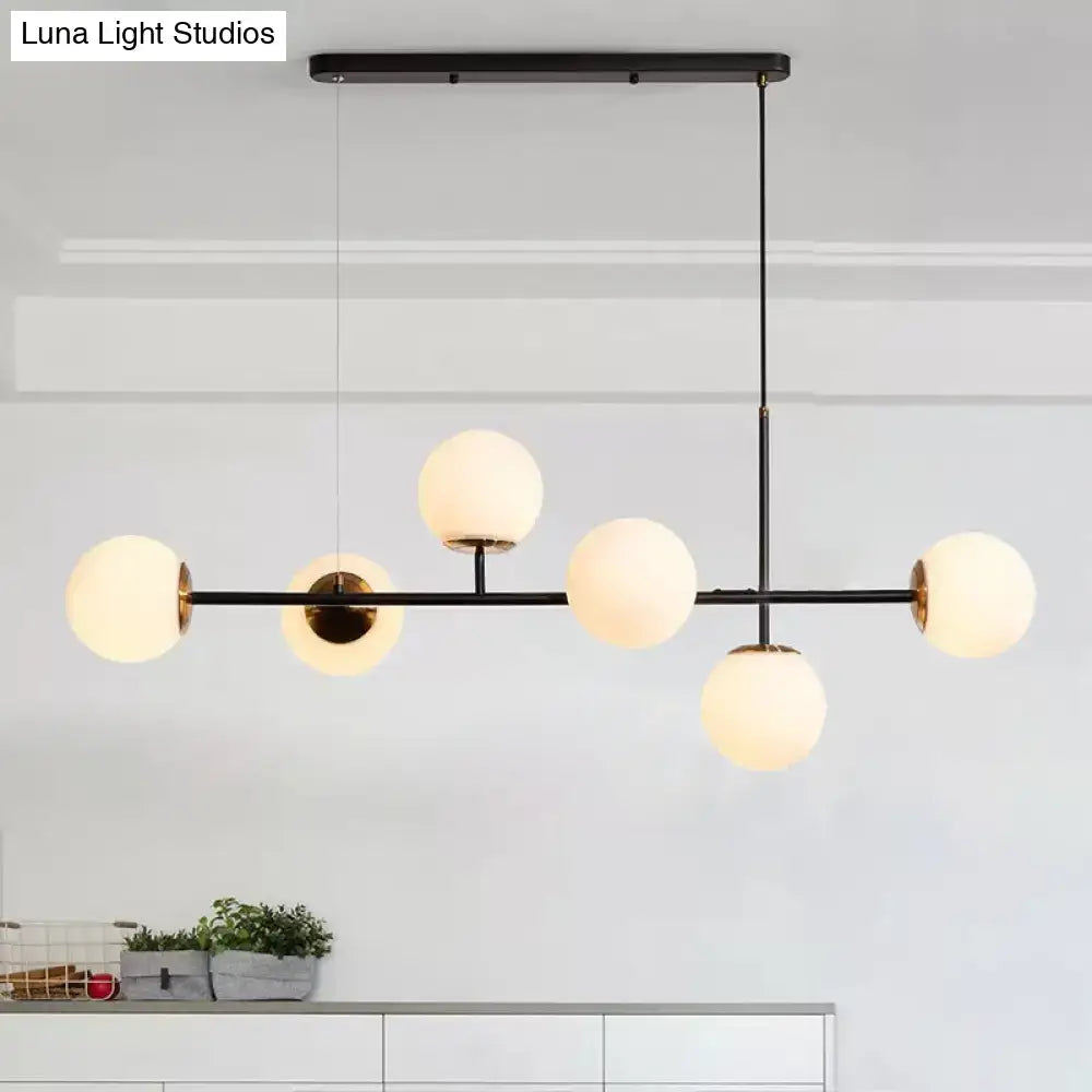 Decorbites 6-light island pendant with amber milky white frosted glass shades and adjustable black metal cord