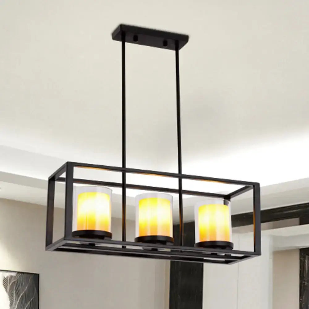 Black metal rectangular light fixture with three warm yellow amber cylinder island candle-style bulbs for kitchen use