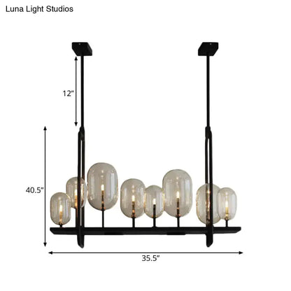 Black metal chandelier with seven frosted globe shades featuring chain cord length and fixture height details