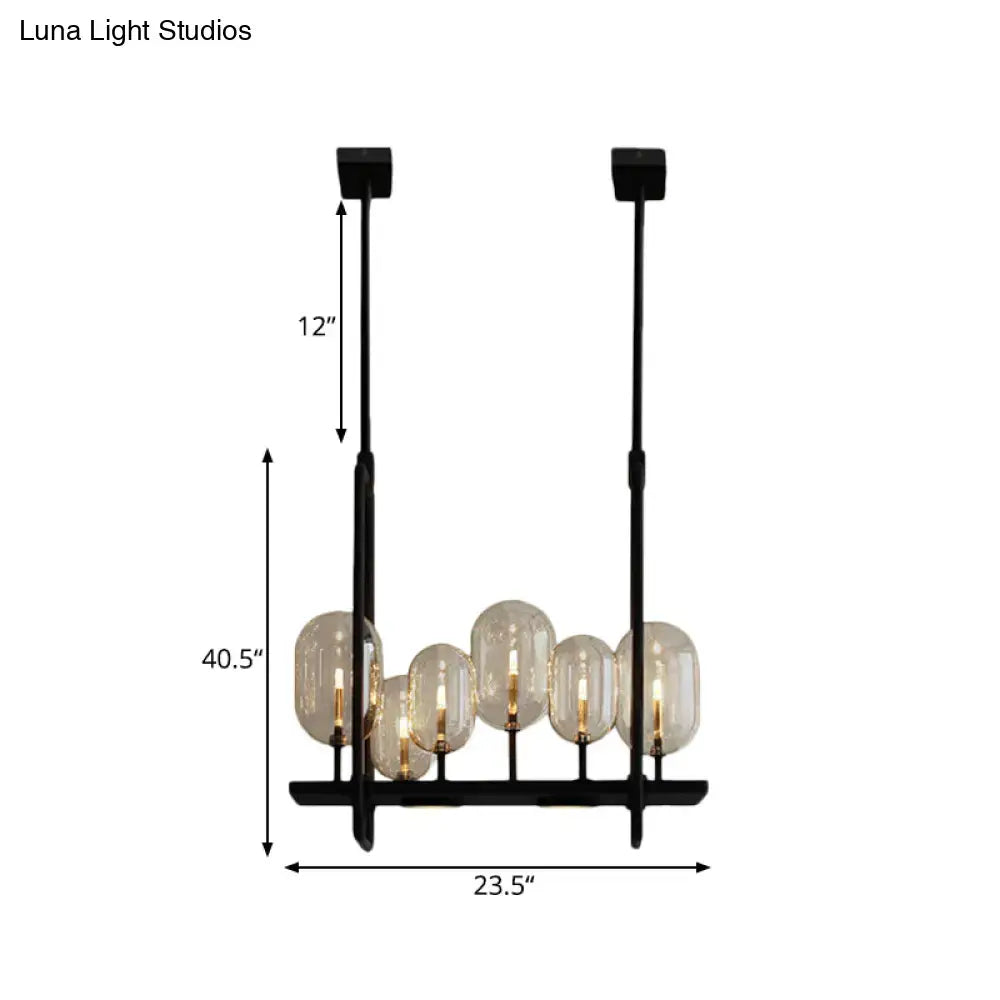 Black metal chandelier with five amber glass globe shades featuring adjustable chain cord length and fixture height