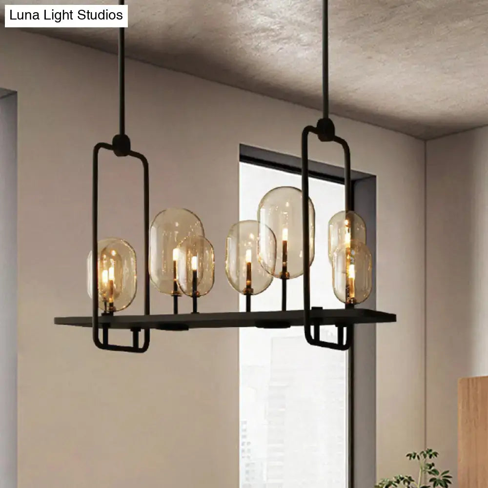 Black metal DecorBites™ chandelier with amber glass globes, candle bulbs, adjustable chain cord length, and fixture height