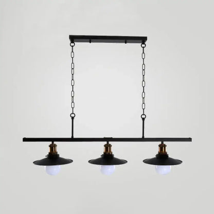 Black industrial-style metal kitchen ceiling light with three exposed bulbs and brass accents for flat shade island lighting