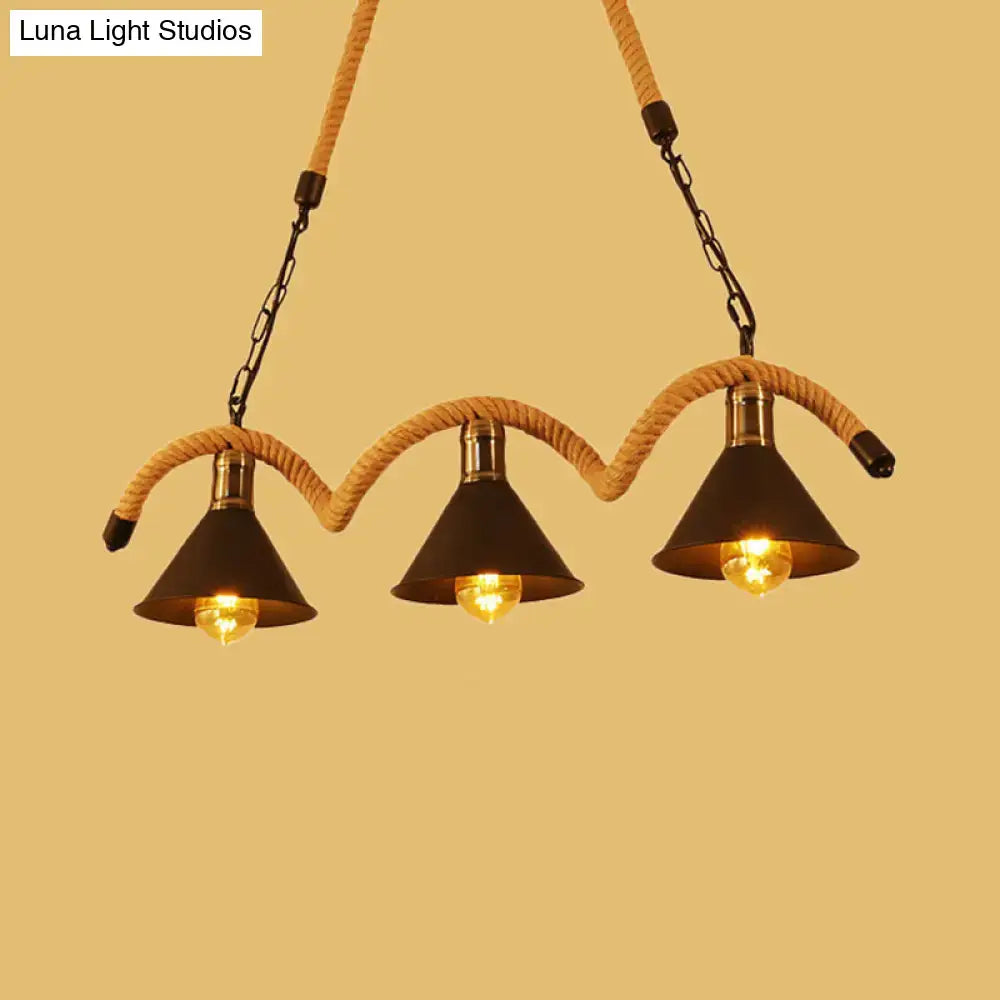 DecorBites™ rustic metal cone island ceiling light with black shades, brass accents, and rope suspension in brown
