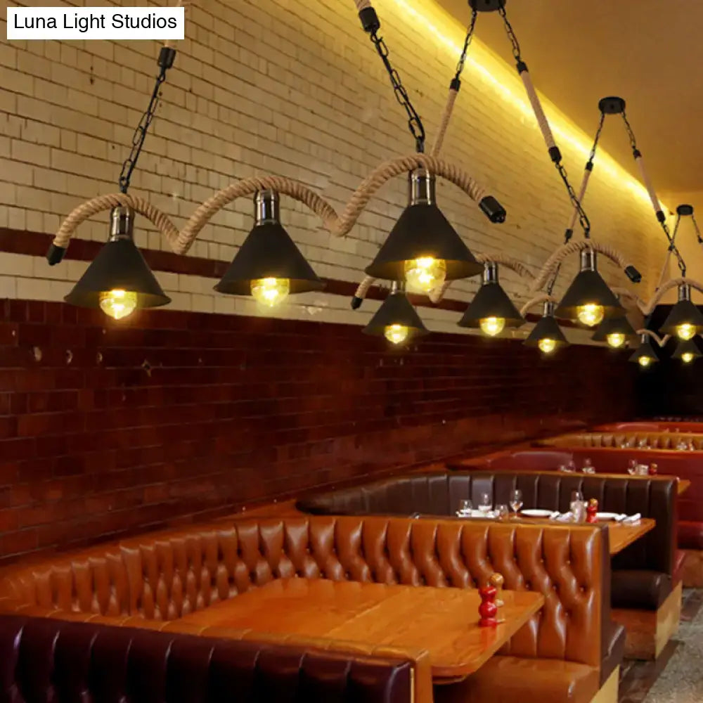 Decorbites™ rustic metal cone island ceiling light in brown with black conical pendants, thick rope, and chain suspension