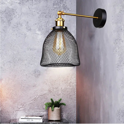 Industrial black and brass led cage wall sconce with black mesh shade for living room decorbites industrial led lighting