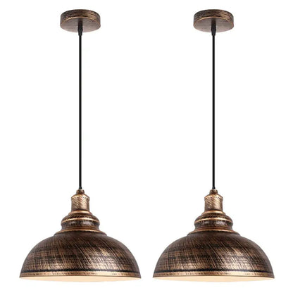 Pair of vintage-style bronze pendant lights with textured distressed metal shades and black cords for industrial loft decorbites industrial loft iron dining room