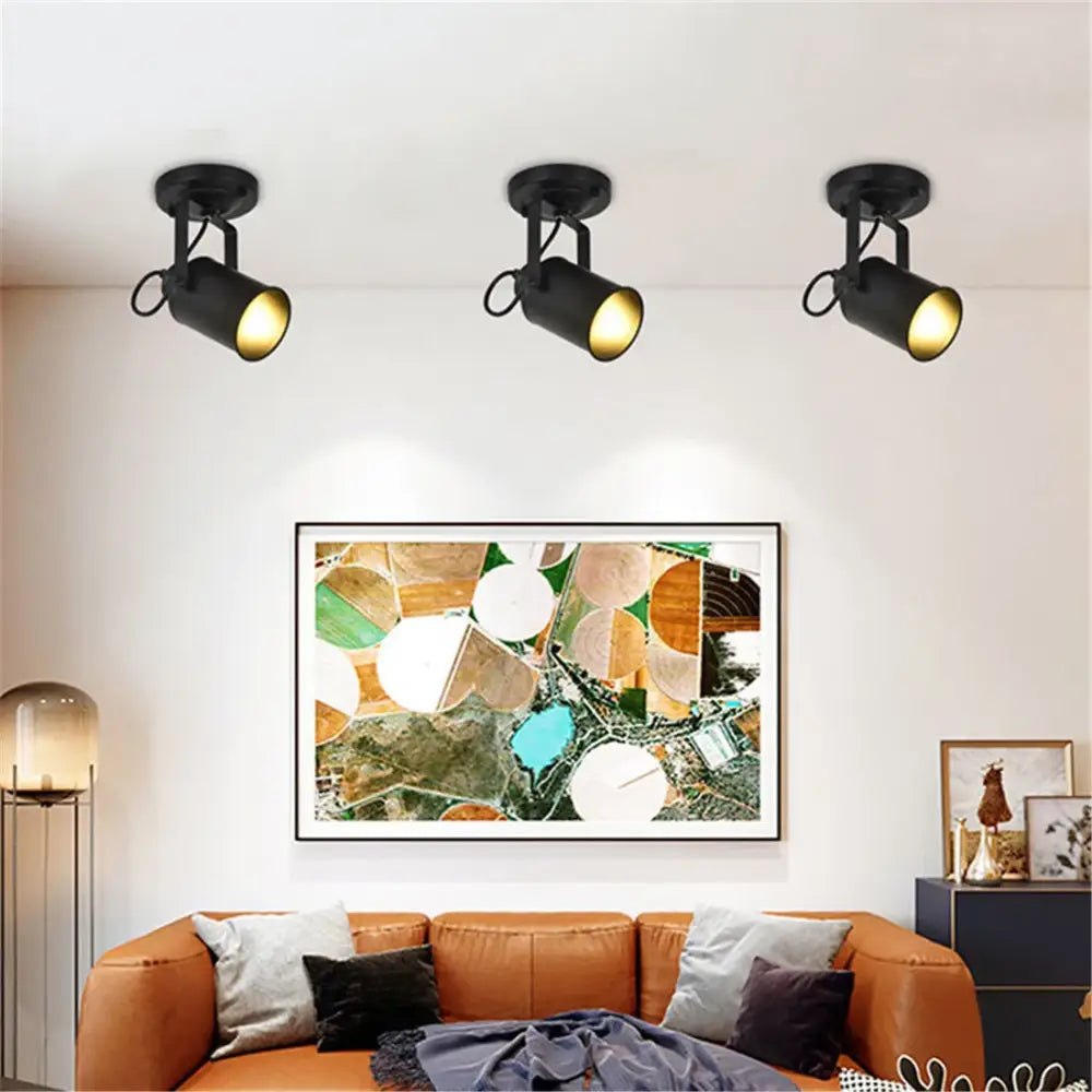 Industrial black and gold wrought iron spotlight with three adjustable black wrought iron arms for living room decorbites black wrought