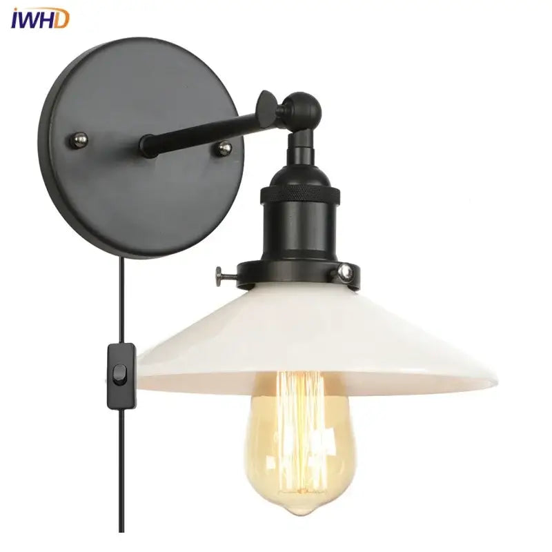 Black industrial-style decorbites led wall sconce with white ceramic shade and exposed edison bulb for bedroom lighting