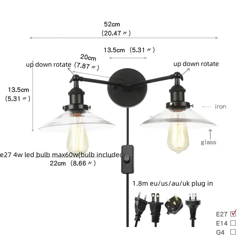 Industrial black iron wall light fixture with two adjustable arms and clear glass shades for bedroom sconce lighting
