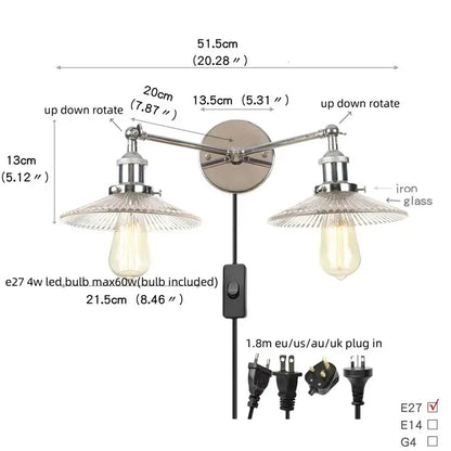 Industrial black and white wall light fixture with chrome iron arms and glass shades featuring two exposed Edison bulbs