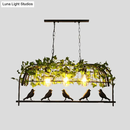 Industrial black metal birdcage kitchen ceiling light with plant decoration and warm e26 e27 glowing bulbs