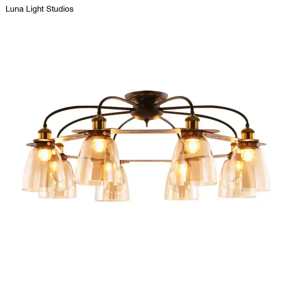 Bronze-finished ceiling lamp with six amber cognac glass bell shades and curved black metal arms for living room use