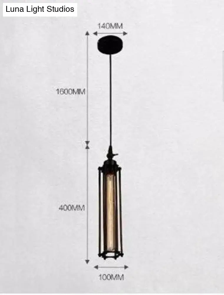 Industrial black and brass flute pendant light with cylindrical glass and exposed filament bulb for kitchen island lighting
