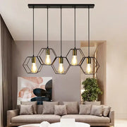 Industrial black and brass hexagonal pendant light with exposed filament bulbs for dining room decorbites industrial led hanging