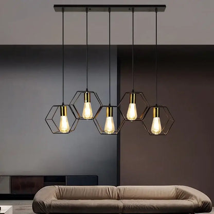 Modern black and brass hexagonal pendant light with filament bulbs featuring decorbites industrial led design for dining room