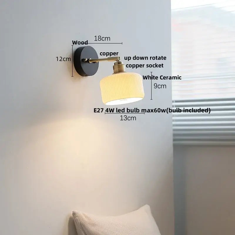 Industrial black and brass wall light fixture with a black wooden backplate copper arm and white ceramic lampshade for bedroom
